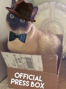 Siamese cat with hat and bow tie